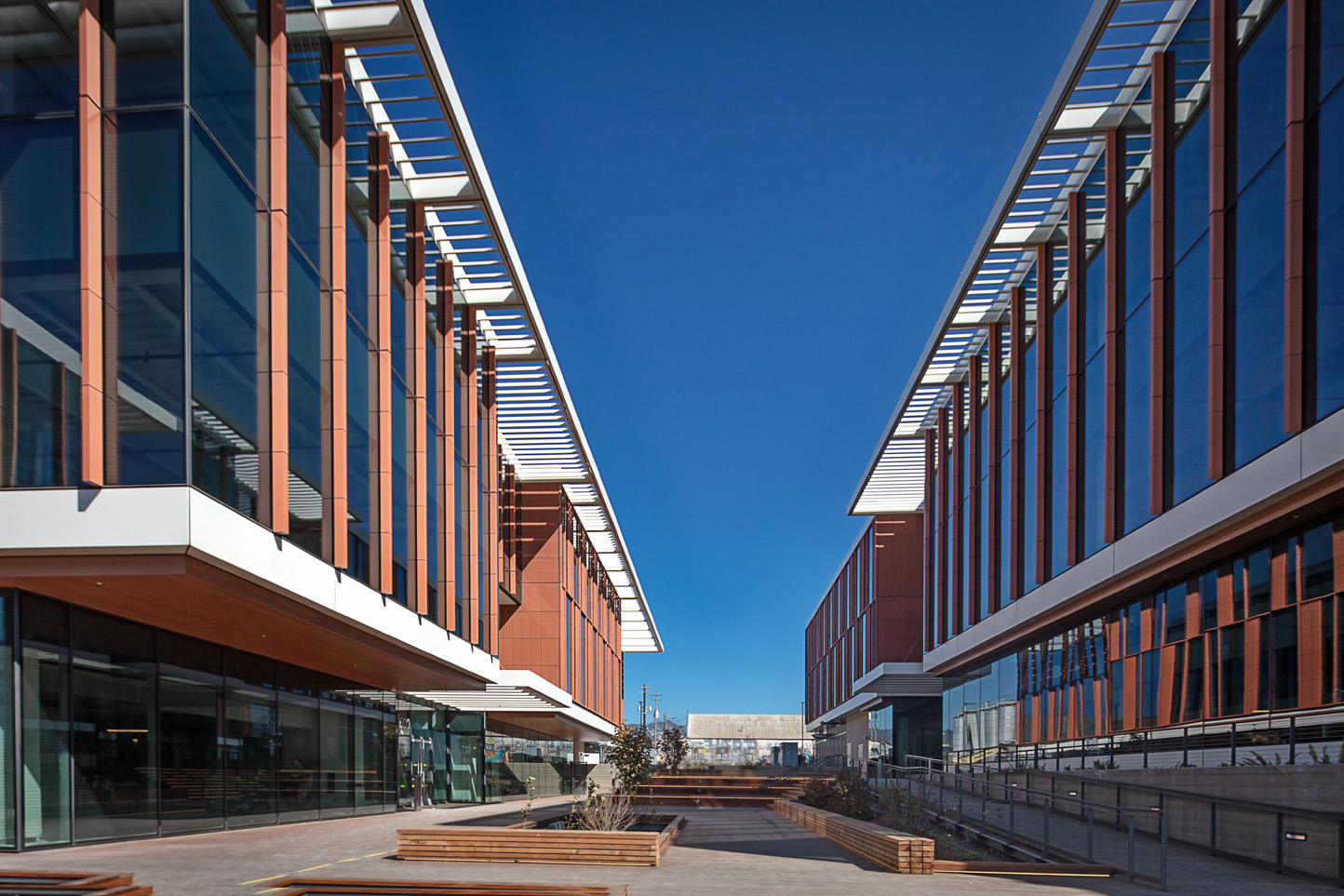 An open space resembling a courtyard flanked by buildings on each side
